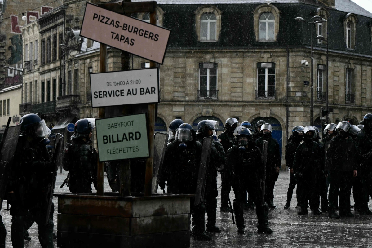 France suspends stun grenades after 15-year-old loses hand at protest