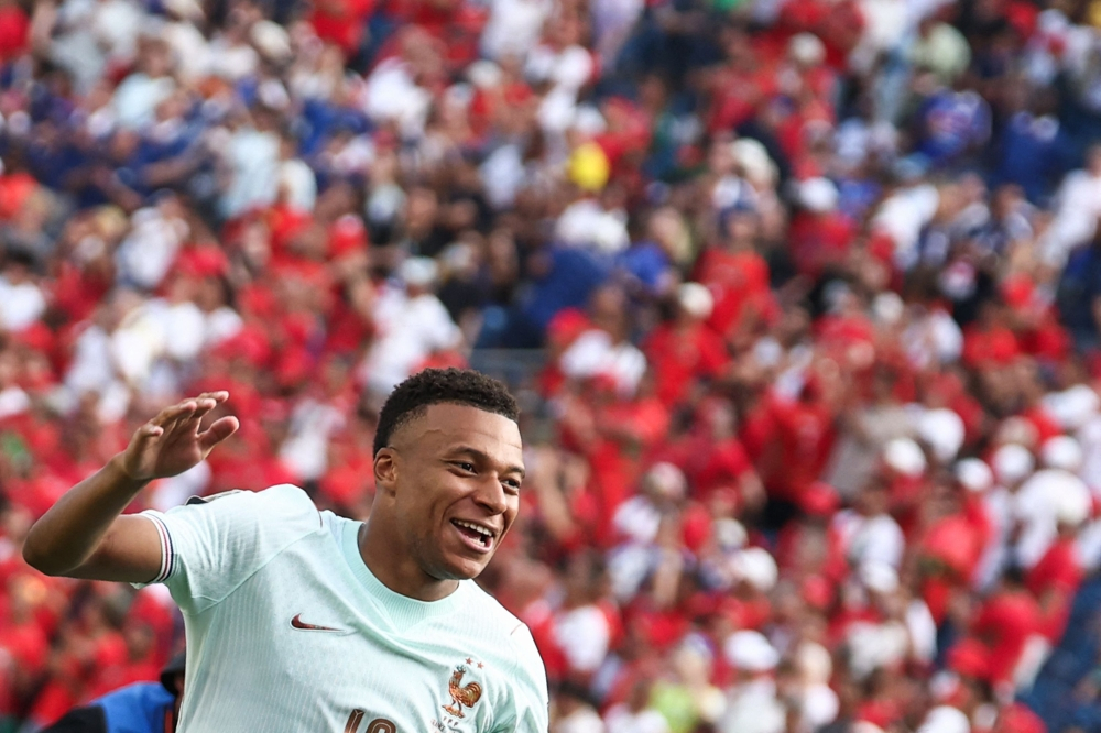 Mbappe and Dembele send France into World Cup semi-finals to face Spain or Belgium