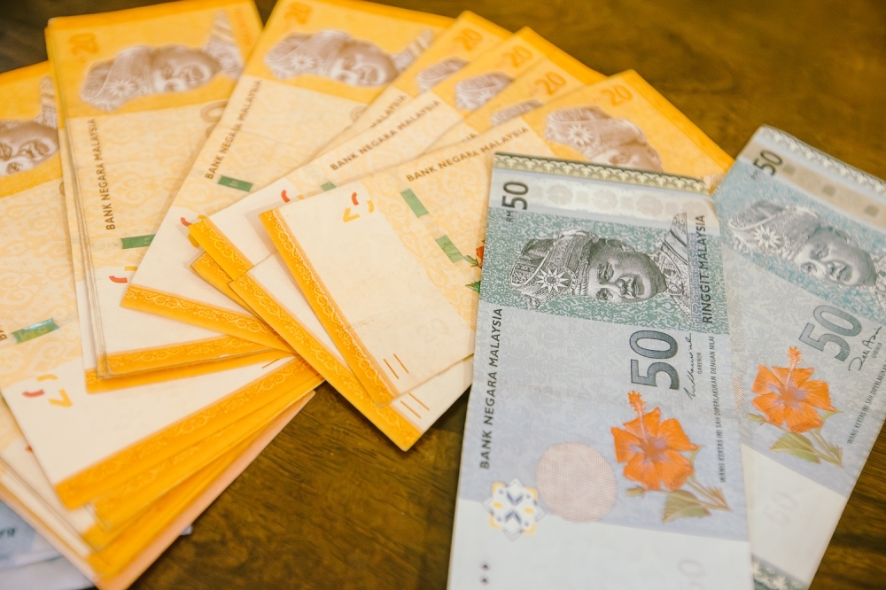 Ringgit rises against US dollar on softer greenback