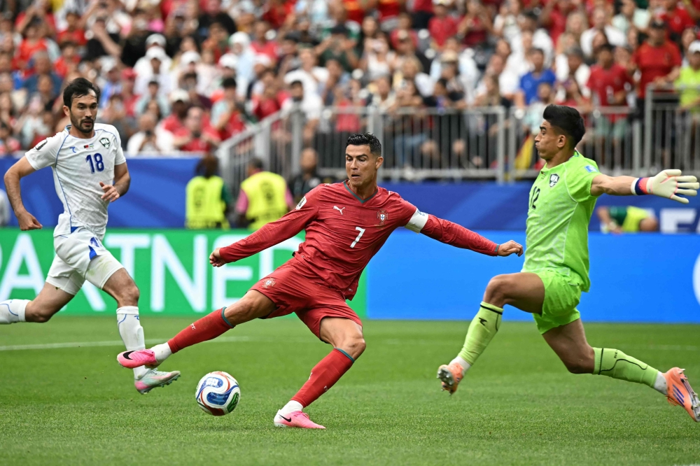 ‘I’m back’: Ronaldo silences critics as Uzbekistan double makes him the first to score at six World Cups