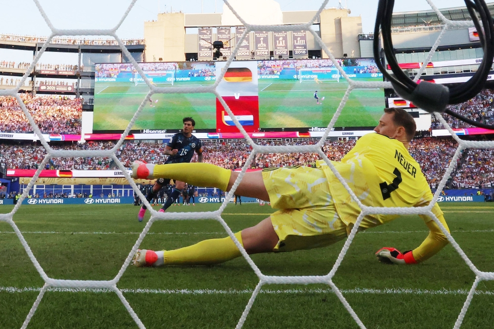 World Cup chaos! Paraguay shock Germany, Brazil escape Japan scare
