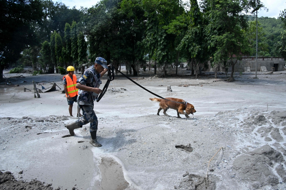 Nepal police release names of 23 Malaysians missing in deadly flood disaster