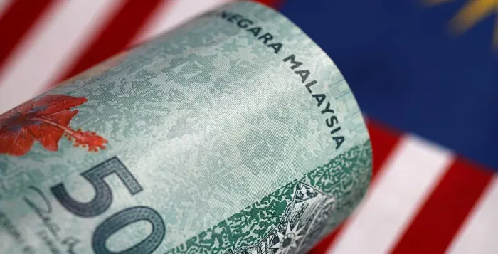 Ringgit opens higher on strong domestic data