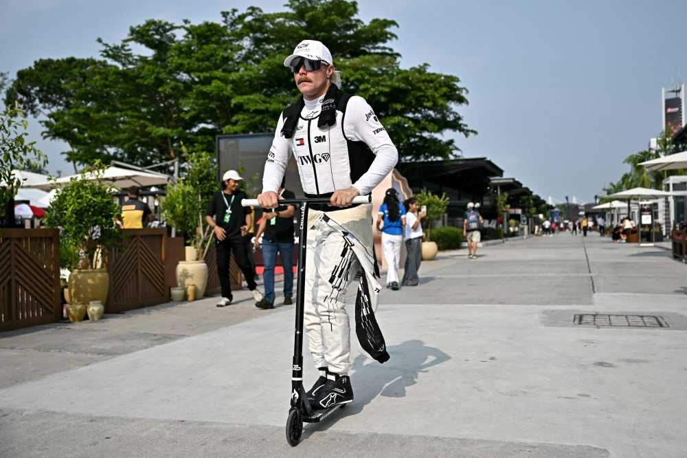 From Sepang to Singapore: F1’s Valtteri Bottas swaps race seat for 350km bike ride